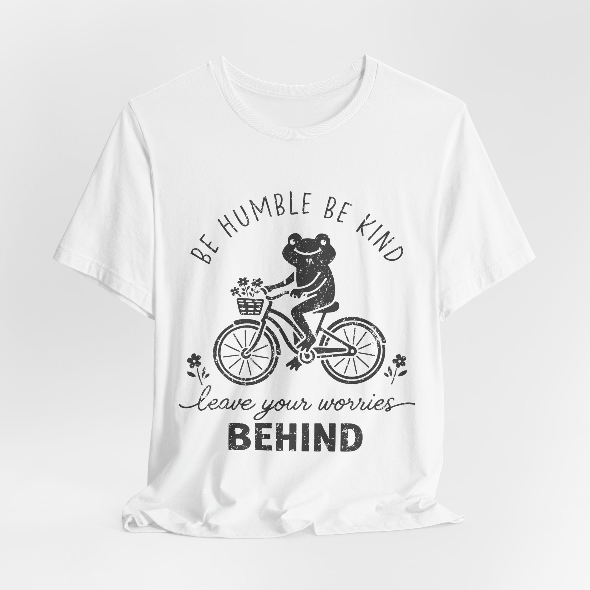 T-Shirt — "Be Humble Be Kind" Frog on Bike Graphic Tee, "Leave Your Worries Behind"