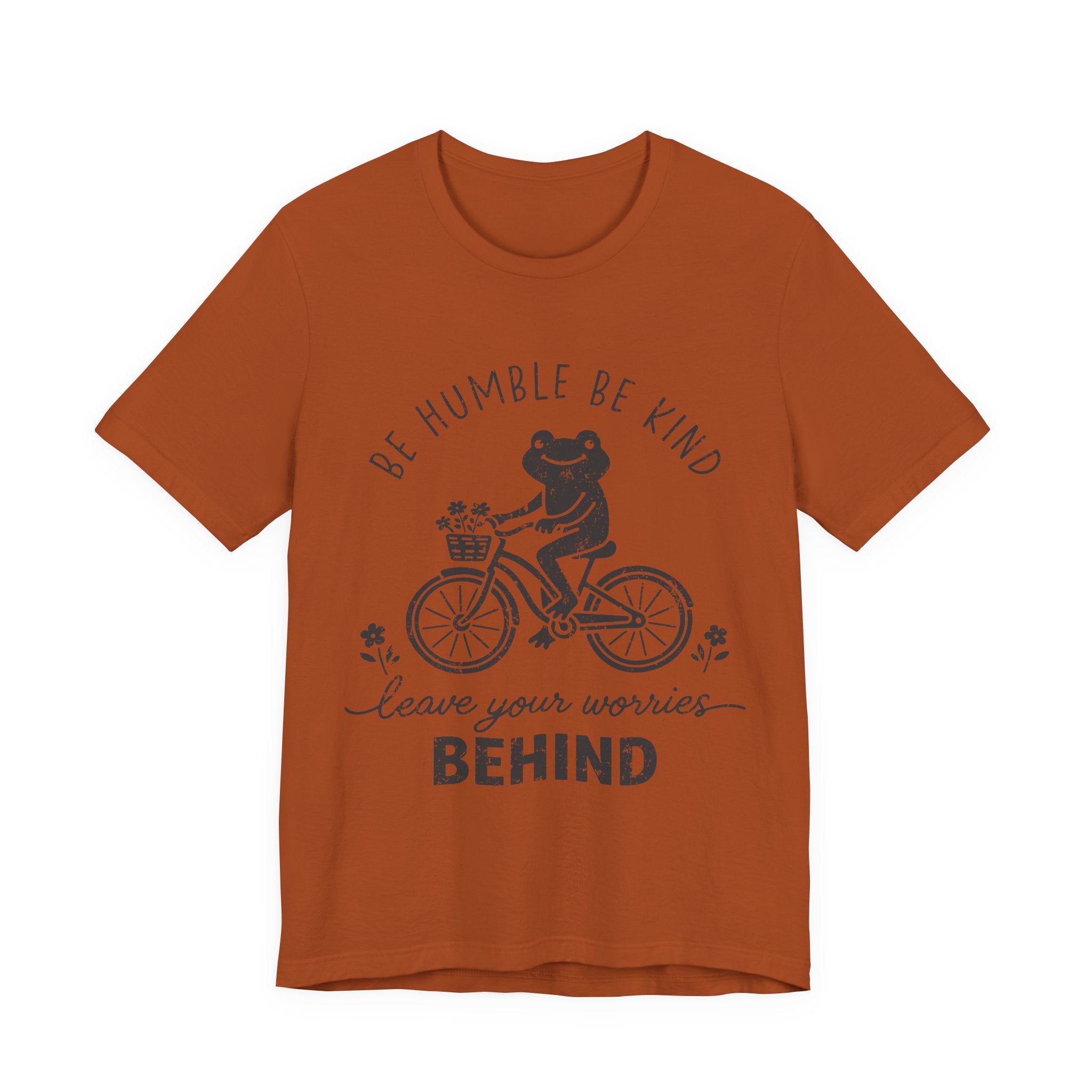 T-Shirt — "Be Humble Be Kind" Frog on Bike Graphic Tee, "Leave Your Worries Behind"