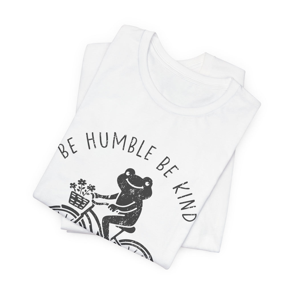 T-Shirt — "Be Humble Be Kind" Frog on Bike Graphic Tee, "Leave Your Worries Behind"