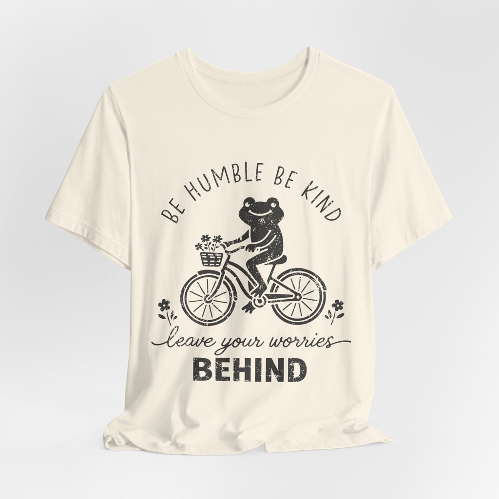 T-Shirt — "Be Humble Be Kind" Frog on Bike Graphic Tee, "Leave Your Worries Behind"
